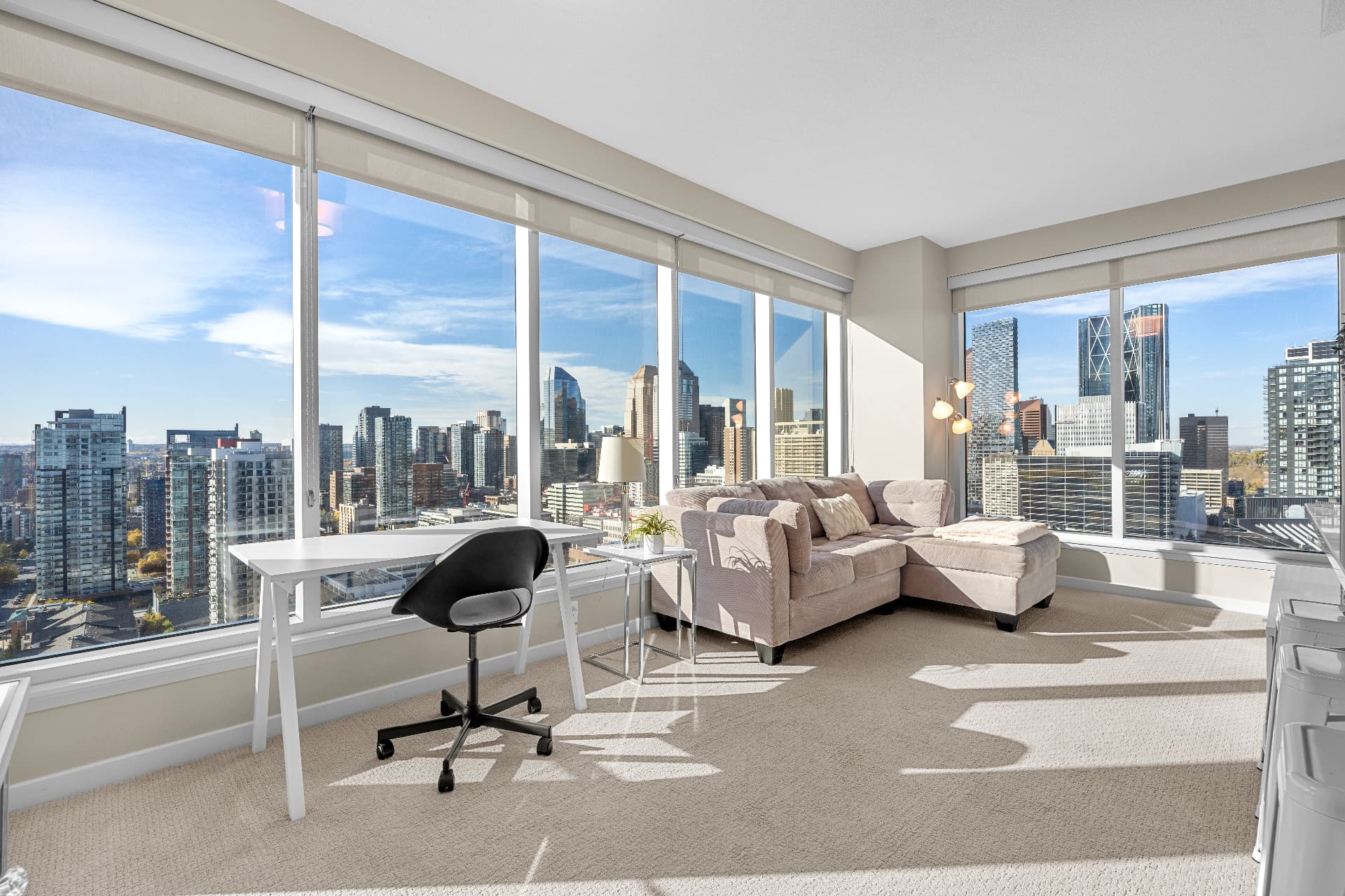 Living room with panoramic skyline views